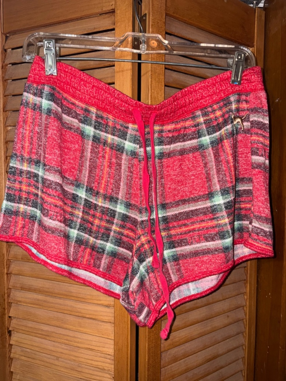 PINK plaid shorts.
